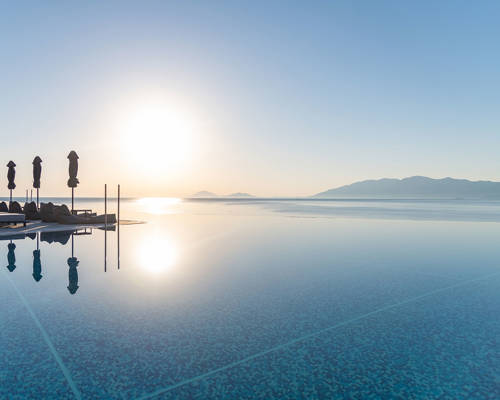 Side view of the pool at sunrise