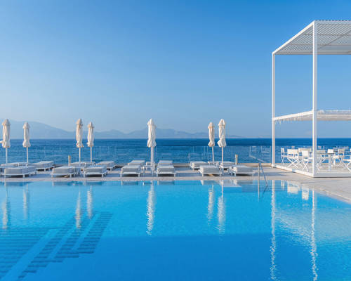 Pool area with sunbeds