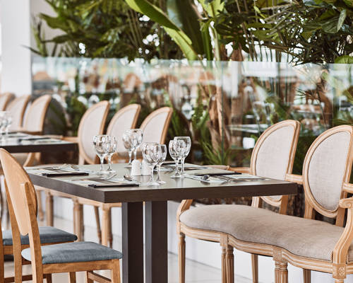 Restaurant table decorated and chairs