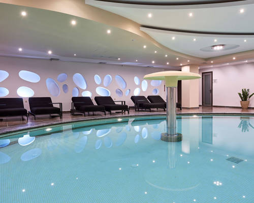 Inner pool with sunbeds