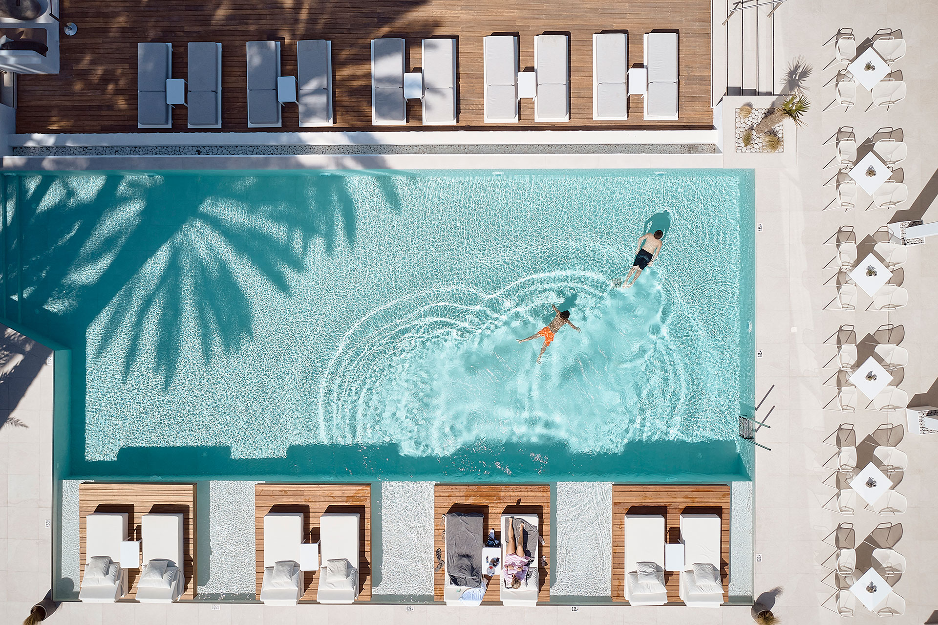 
Top-down view of the pool and sunbeds