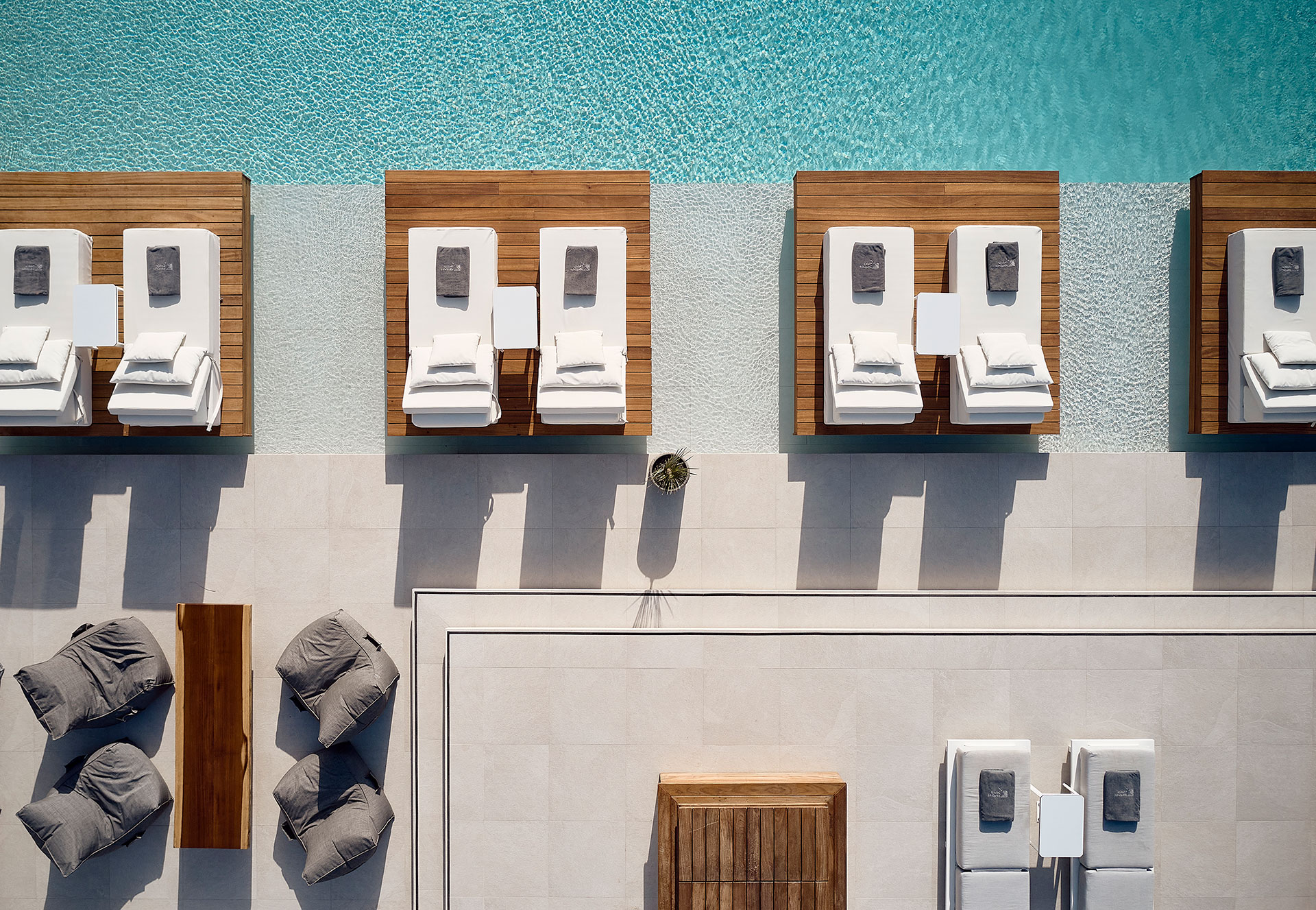 
Top-down view of the pool and sunbeds