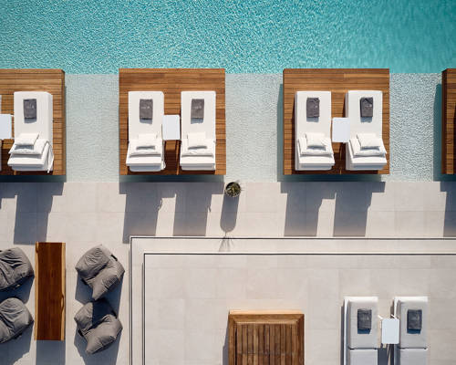 Top-down view of the pool and sunbeds